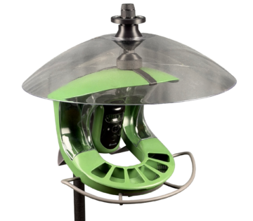 A smart birdfeeder covered by a weather shield