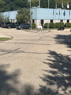 An office building and its parking lot.